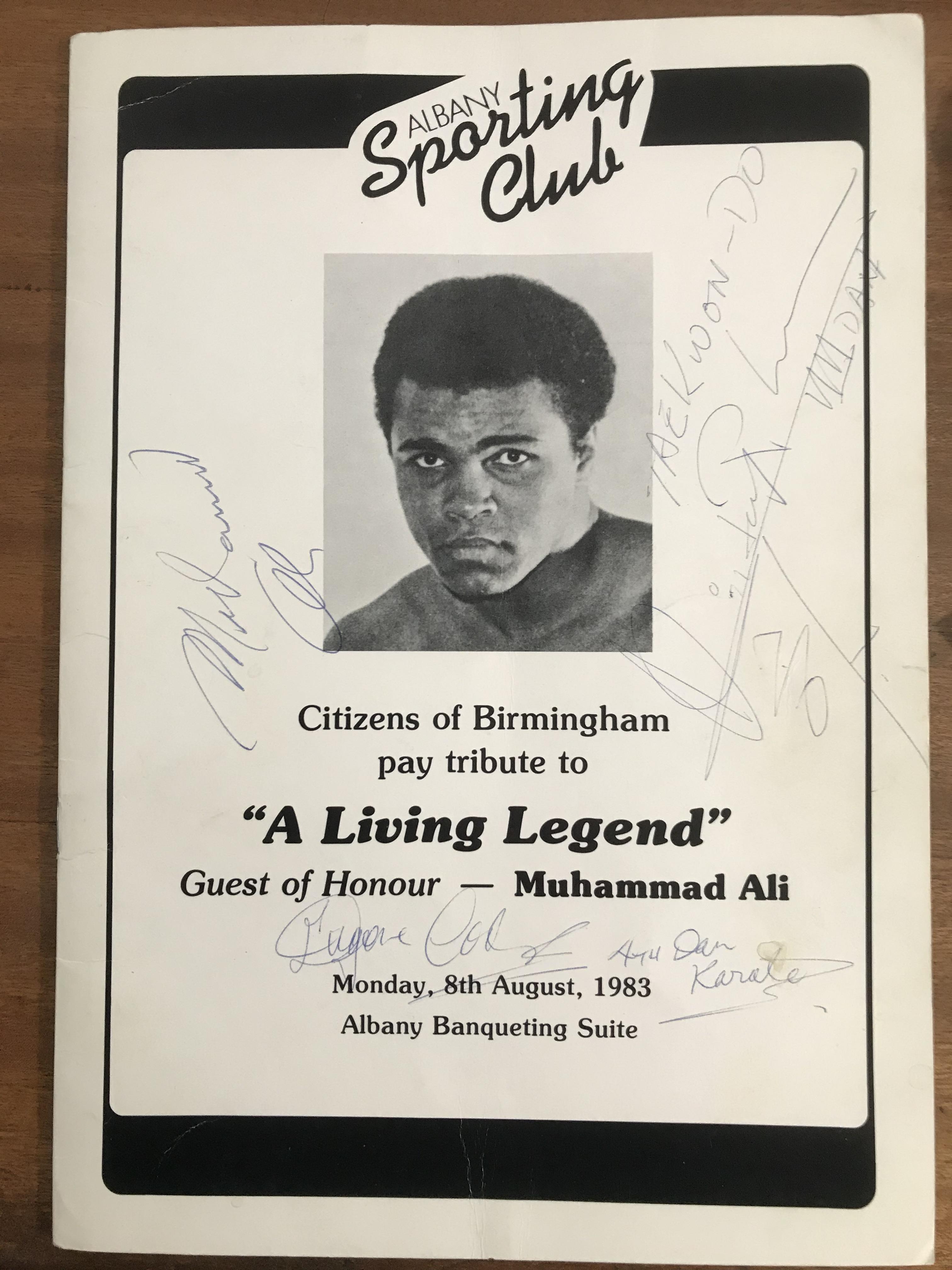 Muhammad Ali signed programme for martial arts meeting, also signed by couple stars of the show.