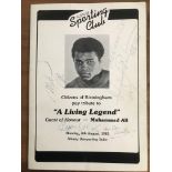 Muhammad Ali signed programme for martial arts meeting, also signed by couple stars of the show.