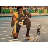 Usain Bolt Selection of three different signed photos