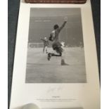 George Best signed 16 x 12 inch b/w print of his goal celebration at 1968 Cup Final.