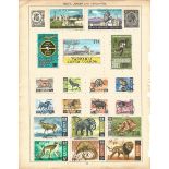 BCW stamp collection on 4 loose album pages. Includes Kenya, Uganda and Tanganyika, Malta, Malaysia,