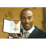 Athletics Colin Jackson signed 12x8 colour photo. Colin Ray Jackson, CBE (born 18 February 1967)