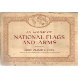 National flags and arms cigarette card collection from John player and sons in album. 50 card full