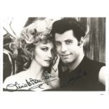 Olivia Newton-John and John Travolta signed 10x8 black and white photo from Grease. All autographs