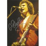 JOHN ILLSLEY Dire Straits signed 8x12 Photo. All autographs come with a Certificate of Authenticity.