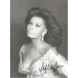Sophia Loren signed sexy 10 x 8 inch b/w photo. All autographs come with a Certificate of