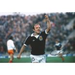 ARCHIE GEMMILL 1978, football autographed 12 x 8 photo, a superb image depicting Gemmell punching