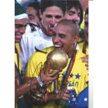 Roberto Carlos Brazil Signed 12 x 8 inch football photo. Good Condition. All autographs come with