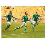 Robbie Brady Ireland Signed 16 x 12 inch football photo. Good Condition. All autographs come with