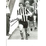 Football Bobby Moncur 10x8 Signed B/W Photo Pictured Leading Newcastle United Out. Good Condition.