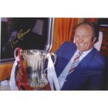 Ron Atkinson signed 12x8 colour photo pictured with the FA Cup while manager of Manchester United.