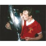 Alan Kennedy signed 10x8 colour photo pictured with the European Cup while playing for Liverpool.