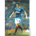 Joey Barton Rangers Signed 12 x 8 inch football photo. Good Condition. All autographs come with a