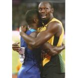 Athletics Usain Bolt and Justin Gatlin signed 12x8 colour photo. Good Condition. All autographs come