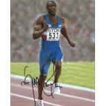 Athletics Linford Christie signed 10x8 colour photo. Linford Cicero Christie OBE (born 2 April 1960)