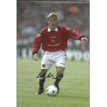 Phil Neville signed 12x8 colour photo pictured in action for Manchester United. Good Condition.