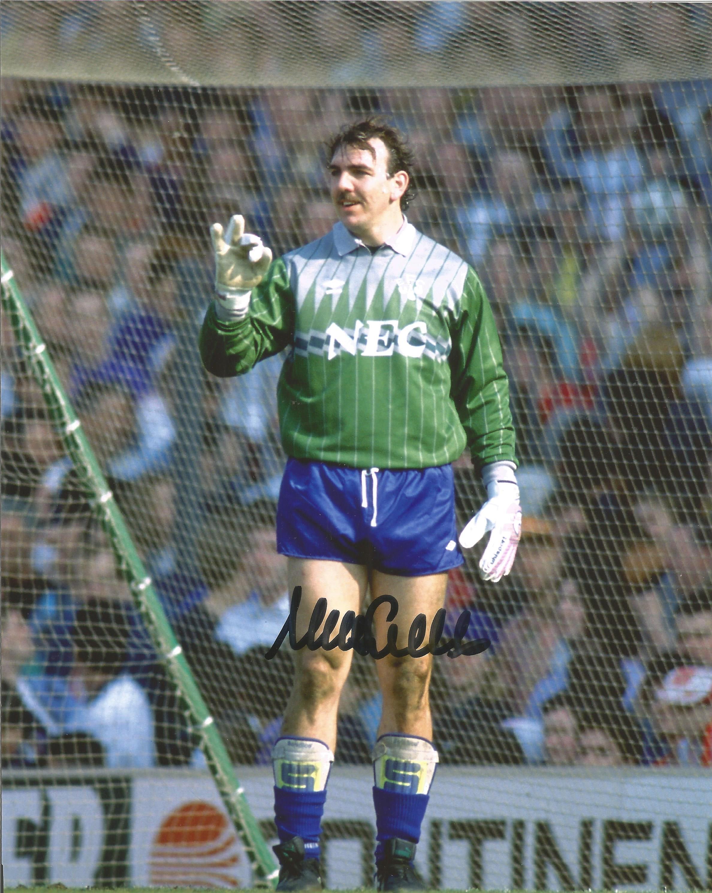 Football Neville Southall signed 10x8 colour photo pictured in action for Everton. Good Condition.