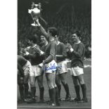 Alex Stepney signed 12x8 black and white photo pictured celebrating with the League championship