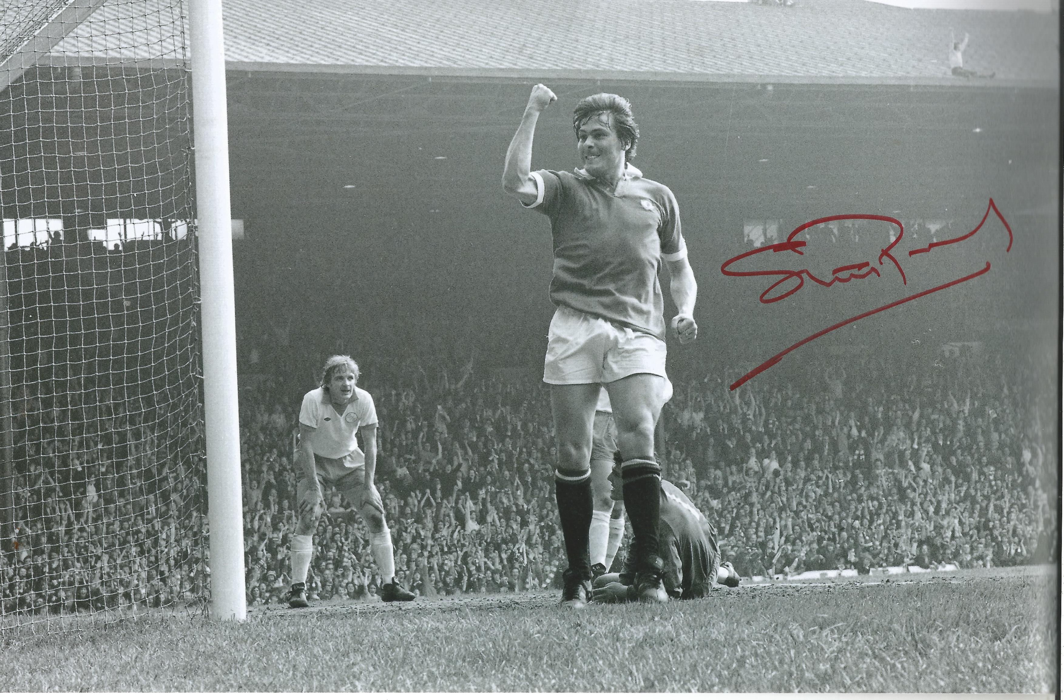 Stuart Pearson signed 12x8 black and white photo pictured celebrating while playing for Manchester
