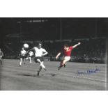 Arthur Albiston signed 12x8 colourised photo pictured in action for Manchester United. Good
