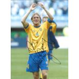 Johan Mjallby Sweden signed 16 x 12 colour football photo. Good Condition. All autographs come