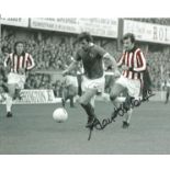 Alan Hudson signed 10x8 colourised photo pictured while playing for Stoke City. Good Condition.