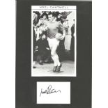 Noel Cantwell 12x8 mounted signature piece includes signed white card and black and white photo.
