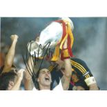 Sergio Ramos signed 12x8 colour photo pictured lifting the European Championship trophy for Spain.