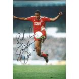 Football John Barnes signed 12x8 colour photo pictured in action for Liverpool. Good Condition.