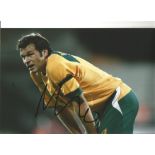 Mark Viduka Australia Signed 12 x 8 inch football photo. Good Condition. All autographs come with a