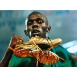 Athletics Usain Bolt signed 16x12 colour photo of the legendary greatest sprinter of all time. Usain