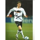 Per Mertesacker Germany Signed 12 x 8 inch football photo. Good Condition. All autographs come