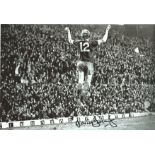 David Fairclough signed 12x8 black and white photo pictured playing for Liverpool. Good Condition.