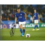 Dennis Praet signed 10x8 colour photo pictured in action for Leicester City. Good Condition. All