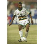 Lucas Radebe signed 12x8 colour photo pictured in action for South Africa. Good Condition. All