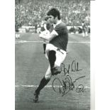 Willie Morgan Man United Signed 12 x 8 inch football black and white photo. All autographs come with