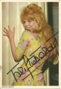 Brigitte Bardot signed 6 x 4 inch colour photo Condition 8/10. All autographs come with a