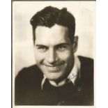 Richard Arlen signed vintage 10 x 8 inch b/w portrait photo fixed to black card, surname in slightly