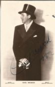 Carl Brisson Signed vintage 6 x 4 inch b/w photo dated 1932 fixed to black card. Condition 6/10. All