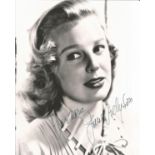June Allyson signed vintage 10 x 8 inch young portrait photo for Nora dedication. Condition 8/10.
