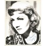 Claudette Colbert signed 10 x 8 inch b/w portrait photo. Condition 8/10. All autographs come with