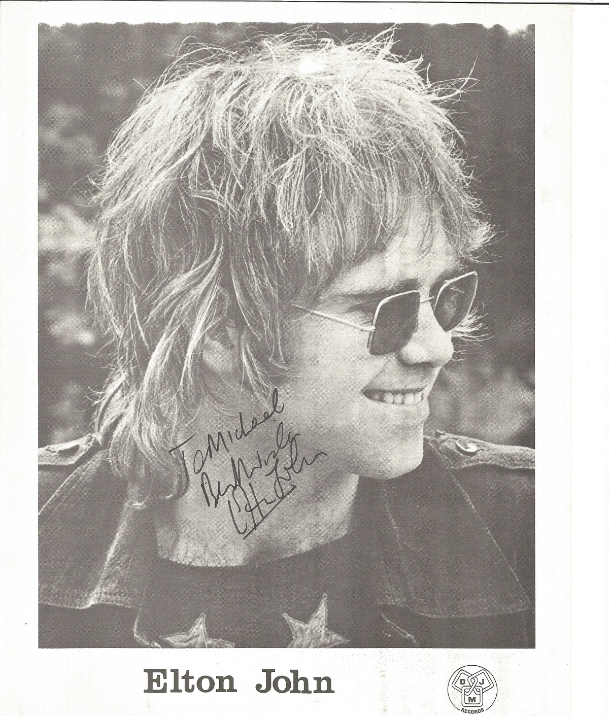 Elton John signed young 10 x 8 inch b/w matt photo to Michael. DLM records promo.