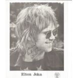 Elton John signed young 10 x 8 inch b/w matt photo to Michael. DLM records promo.