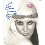 James Bond Caroline Munro signed 10 x 8 inch b/w photo with added pink Lipstick Kiss to top RH side.