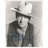 John Wayne signed 10 x 8 inch b/w photo to Michael. Image as Sheriff with State of Texas badge.
