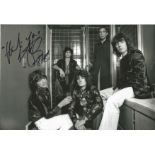 Charlie Watts Rolling Stones signed 12 x 8 inch b/w photo, small crease to BRH edge. Condition 7/10.