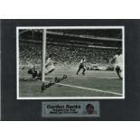 Gordon Banks signed 10 x 8 inch b/w photo of his legendary Pele save, mounted with plaque to 16 x 12