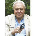 Sir David Attenborough signed 12 x 8 inch colour photo with butterfly on his finger. Condition 8/10.