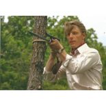 Edward Fox signed classic Day of the Jackal 12 x 8 inch colour sniper practise photo.