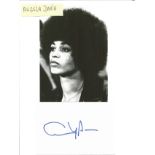 Angela Davis signature piece stuck below black and white photo. All autographs come with a